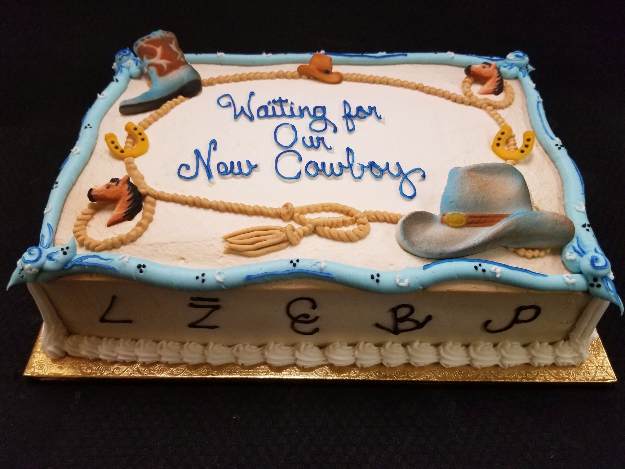 Cowboy baby sales shower cake